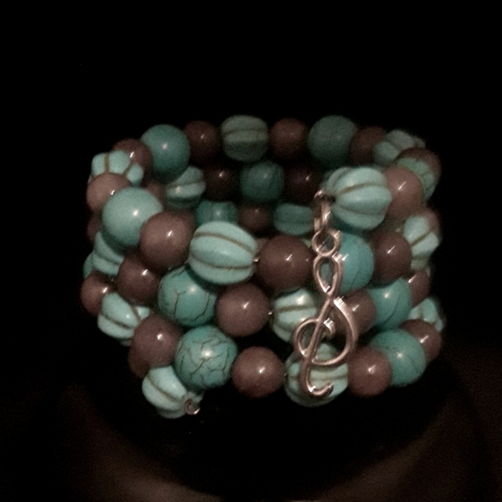 Stone quadruple wrap bracelet.